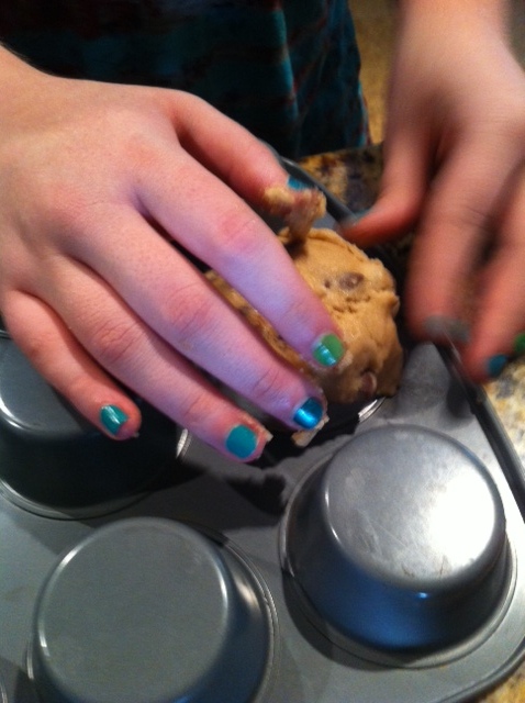 A great tip is to put flour on your hands to keep the cookie dough from sticking while you are making the bowls.