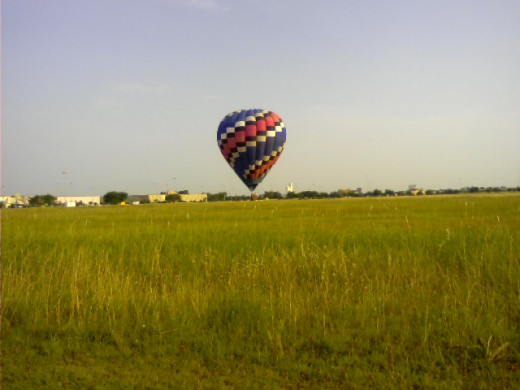 When the Hot air balloon is full of hot air, and fully inflated, their enough hot air to lift the balloon, the basket and its passengers into the air.