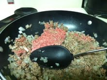 Brown ground beef with the onions.