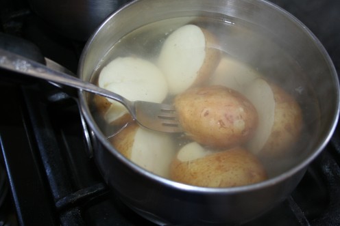 Potatoes are cooked when the fork goes in easily