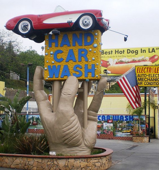Certainly a one of a kind sign advertising car wash services by hand