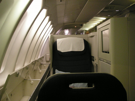 There is ample storage space in the upper bins as well as the panelling under the windows
