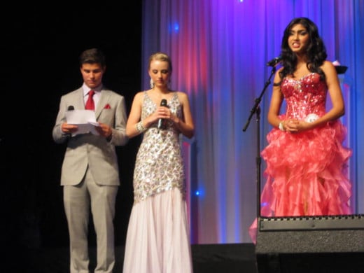 Degrassi's Luke Bilyk reads skill testing question to Megha Sandu, Miss Teen Quebec before she became the 2013 Miss Teen Canada World  - questions were only asked to the final five.