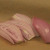 Peeling reveals the shallot's inner violet color, and slicing, whirls of violet and white. Peeling reveals the shallot's inner violet color, and slicing, whirls of violet and white.