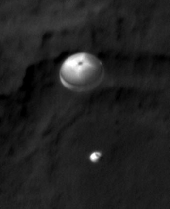 [Update Aug 6, 2012] HIRES camera of Mars Reconnaissance Orbiter, an older spacecraft that's been studying Mars from space for years, managed to capture photo of Curiosity's descent stage!!!! (Sent in Aug 6, about 9AM PDT)