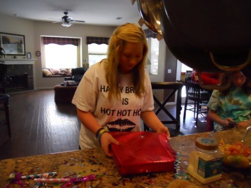 Already wearing a shirt that I made for her, Haley goes to open another!