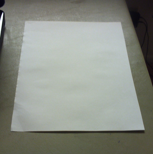 Cut a sheet of drawing paper down to the size you want for the handmade card.