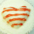 White chocolate heart molded from silicone ice tray.