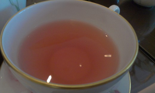Fruity tea, called "Sweet Kiss". A mixture of strawberry, pineapple, kiwi, rosehip, hibiscus, apple flavours etc.