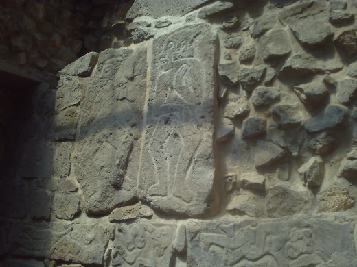 Dancer stelae on the wall inside of the Temple of the Dancers.