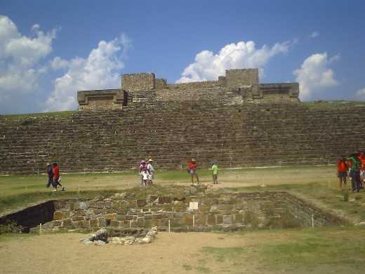 Building H in the background with the altar in the Main Plaza on the ground (looking from Building P)