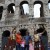 Getting their pictures taken with the Gladiators in front of The Roman Coliseum