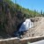 Waterfall along the roadway Waterfall along the roadway