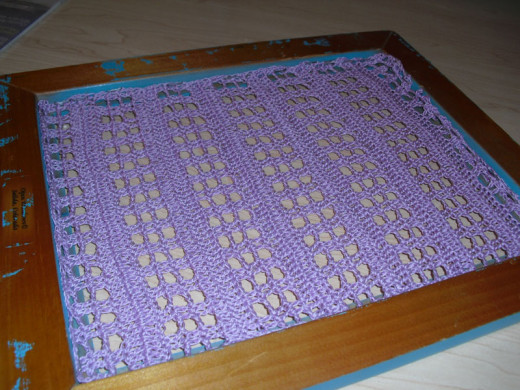 Staple your material to the frame.