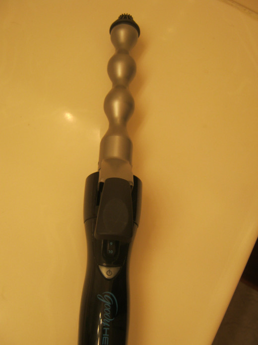 Goody Heat Wave Creator Spiral curling iron for creating beach waves in hair. You have to be VERY careful with these, they get VERY hot and can cause burns! I got burned the first time I used it, but not since. You get used to it!