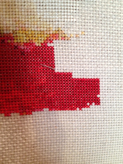 This shows the completed 6 stitches where I came back across from the upper right corner down through the lower left corner to complete the Xs. This shows the completed 6 stitches where I came back across from the upper right corner down through the lower left corner to complete the Xs.