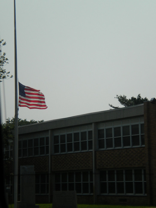 The Flag at half staff at the local high school