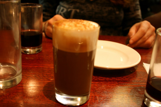 Prepared in three layers, the bottom is of brewed espresso, second layer is of warm milk (latte) and the top third is made from frothy, foaming milk.  