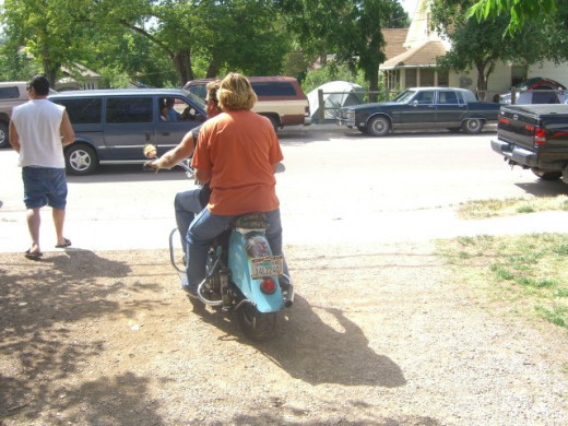 My mom on the back of the Indian.  She takes one ride a year.