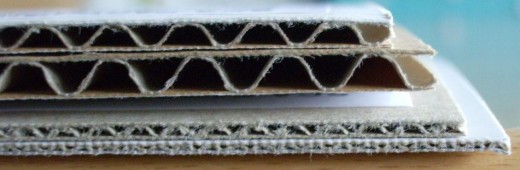 There are many types of corrugated cardboard wraps available. I use single face corrugated cardboard for shipping.