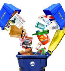 The blue recycling bin where newspapers and other recyclable items go.