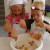 Together they add the apples to the dry ingredients. Together they add the apples to the dry ingredients.