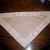 If experienced with machine sewing, you may want to pin the trim on, then pin the second triangle on, and sew the three layers together all at once. If experienced with machine sewing, you may want to pin the trim on, then pin the second triangle on, and sew the three layers together all at once.