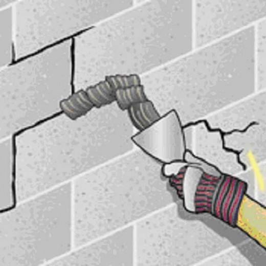 Fig 1.  Patching up a leaky wall with waterproof mortar.