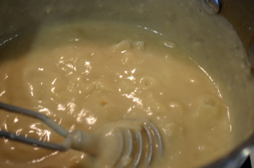 Bring pudding to a soft rolling boil, stirring constantly until the mixture starts to thicken.  Cook for about 5 minutes.