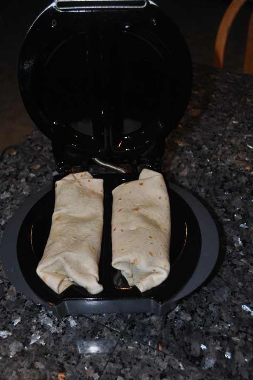 Grease the GT Xpress and place your rolled wraps inside the chamber.