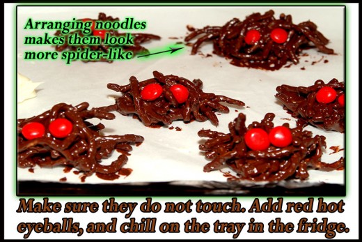 Arrange the spiders on the lined tray so they don't touch. Adjust some of the noodles to look like legs. Chill in refrigerator to harden chocolate.