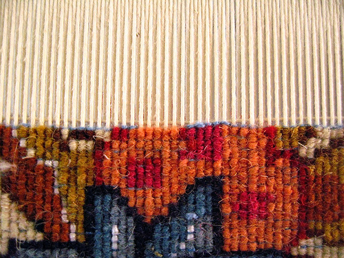 Woven carpet uses a technique similar to that of woven textiles.