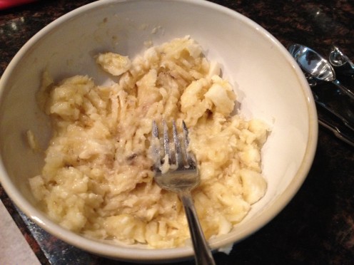 Mash bananas with a fork