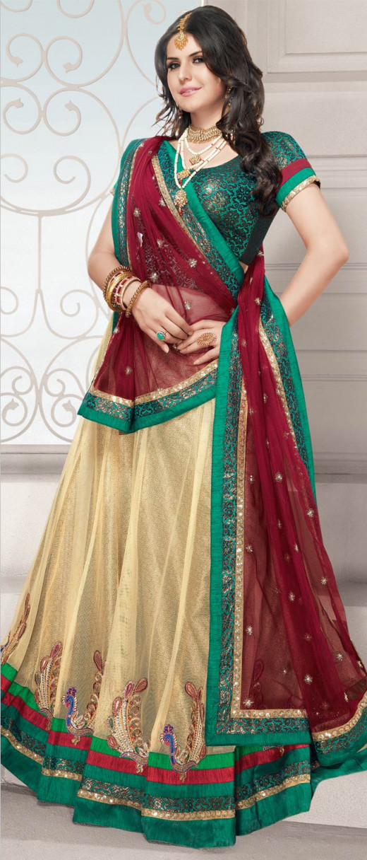 Fawn Net Flare Lehenga Choli With Dupatta