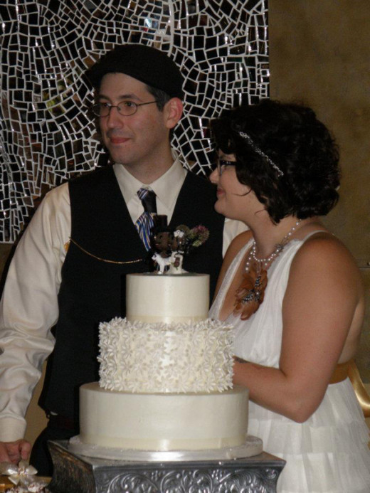 Cutting our wedding cake as Mr. and Mrs. Rode