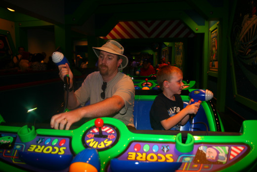 The Buzz Lightyear ride is a combination arcade game and dark ride. 