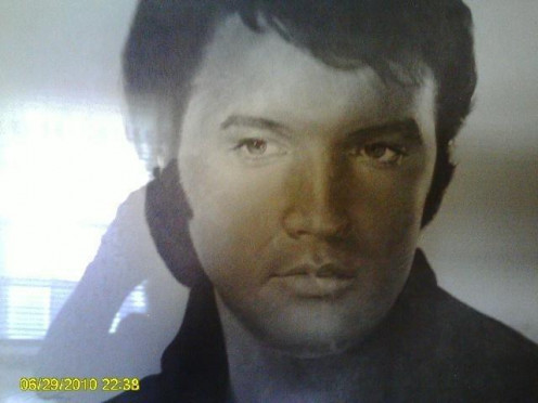 Ruby bought this picture of Elvis the day he died and cried all day.