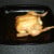Roast chicken is removed from the oven