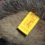 Ear tag with a slash between numbers. Ear tag with a slash between numbers.