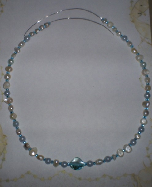 Finish beading the necklace.