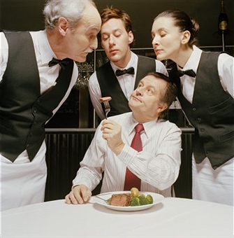 "Acting" like you are important only to impress the restaurant staff.