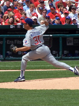 Right handed pitcher Greg Maddux