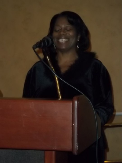 Sharing a poem at a women's prayer luncheon for my church.