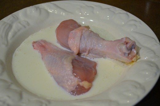 Dunk chicken lightly in buttermilk, roll to coat.
