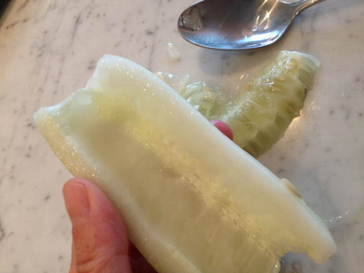 If you have large cucumbers, this is a good use for those. Use a spoon to scoop out the seeds.