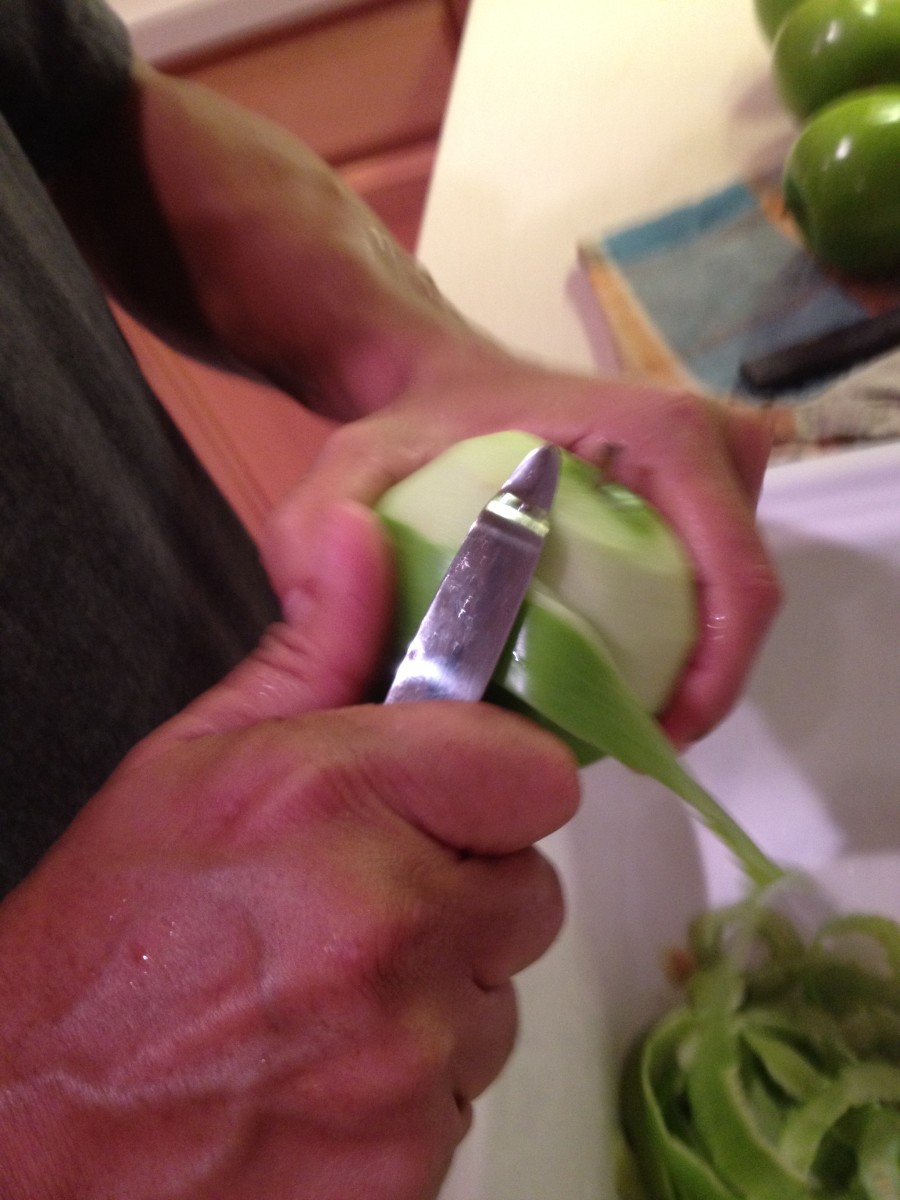 Peel the apples with a paring knife.