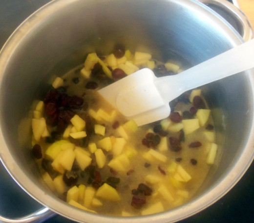Add in the dried fruit and apples and bring to the boil.  Then simmer until the apples soften.