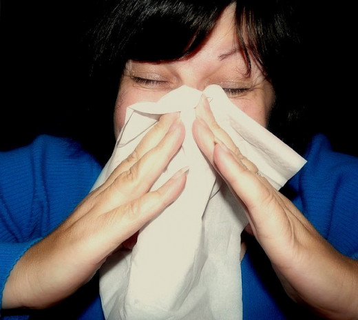 Sneezing is a common allergy symptom.