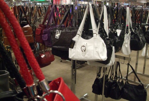 Handbag section of a retail store.
