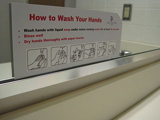 A sign, illustrated with graphics, showing the proper method of washing hands.